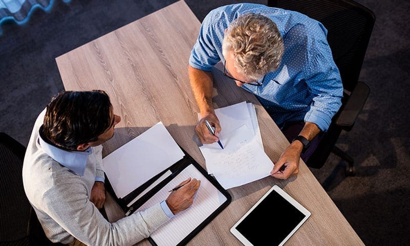 two-men-reviewing-paperwork-800x480-fr